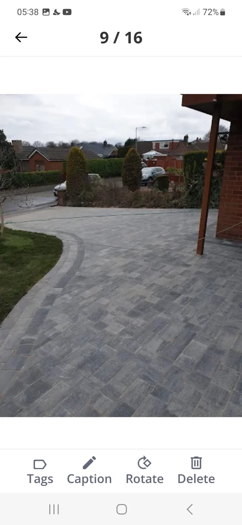 Sweeping block paved driveway in charcoal mix