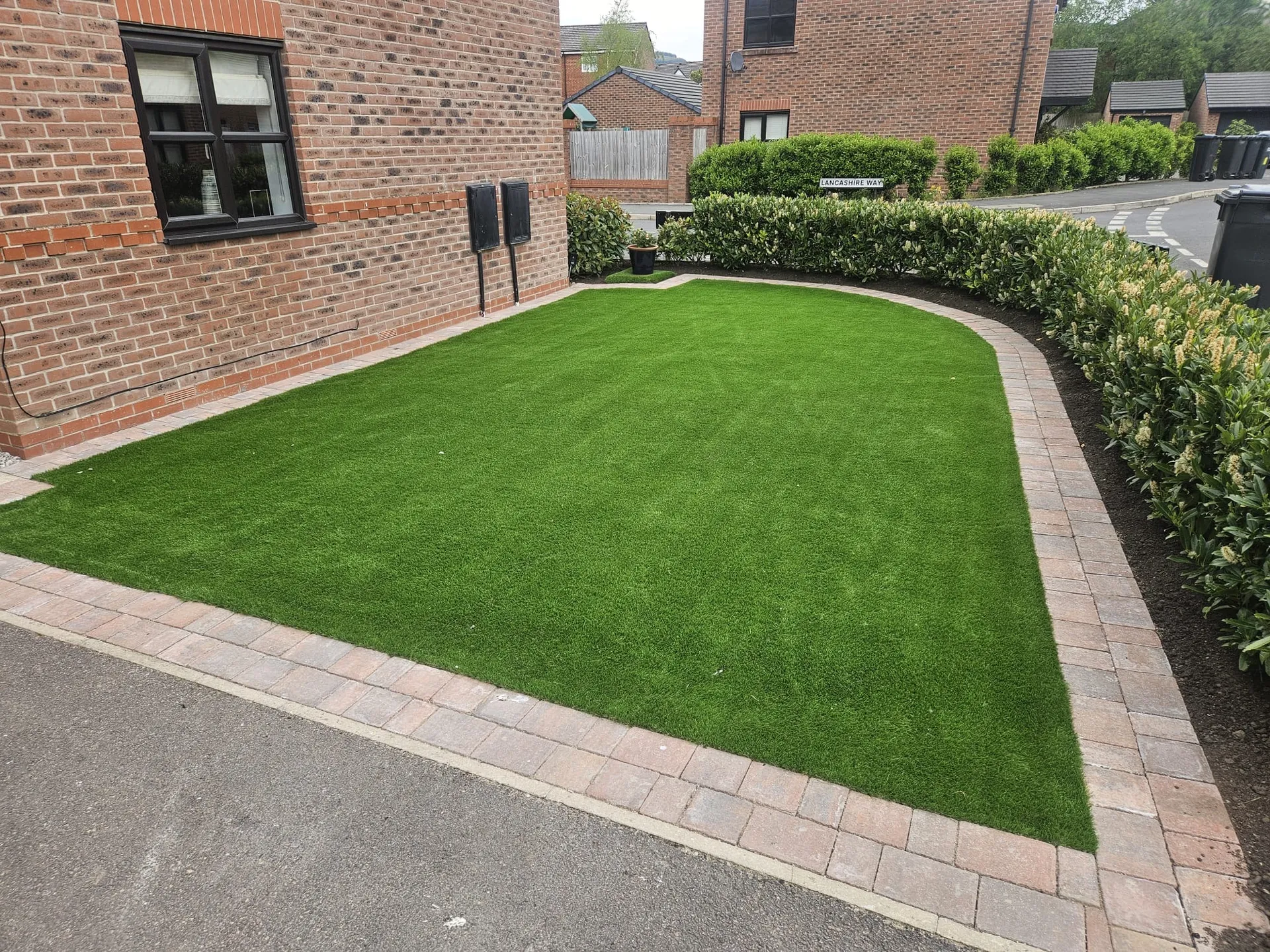 Artificial grass garden with paving
