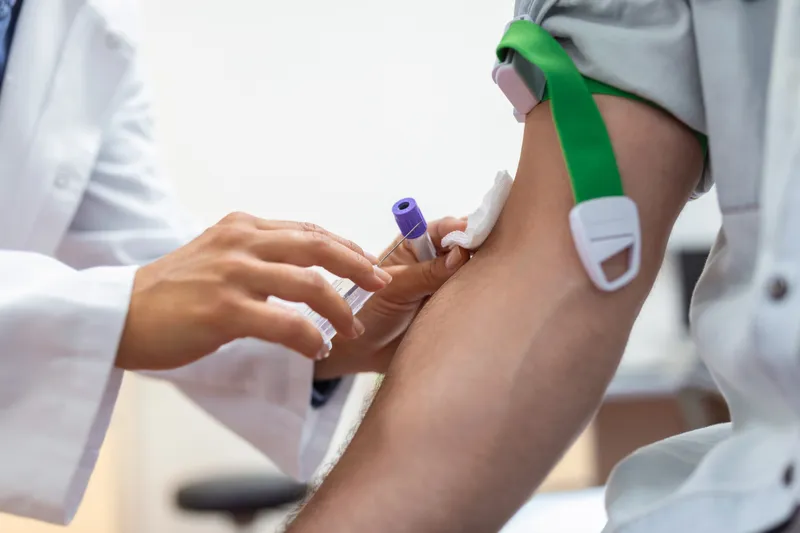 Medical professional consulting with patient about aesthetic and hormone treatments in Altrincham