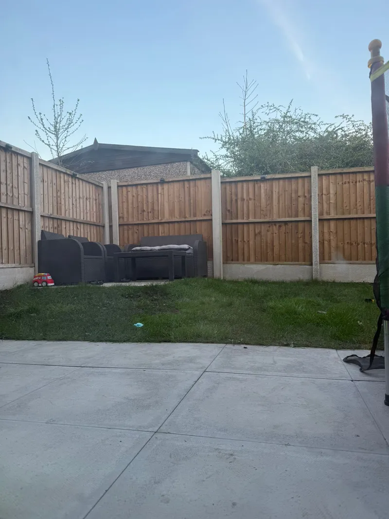 Panel fencing with trellis top