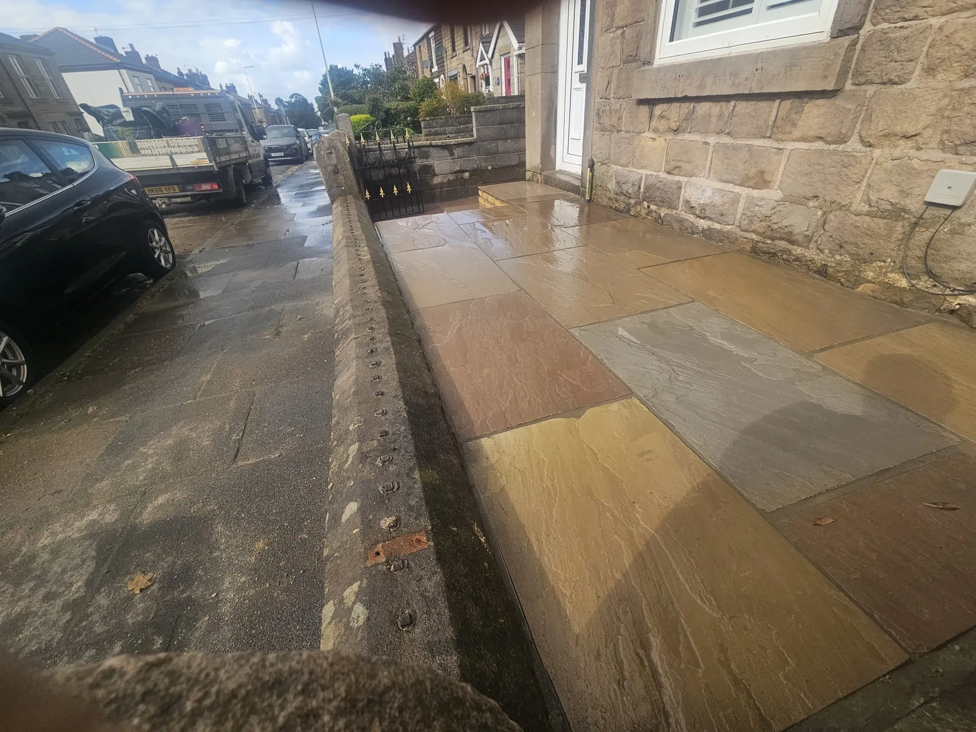 Finished Indian sandstone front garden paving in Adlington by Barlow Landscapes
