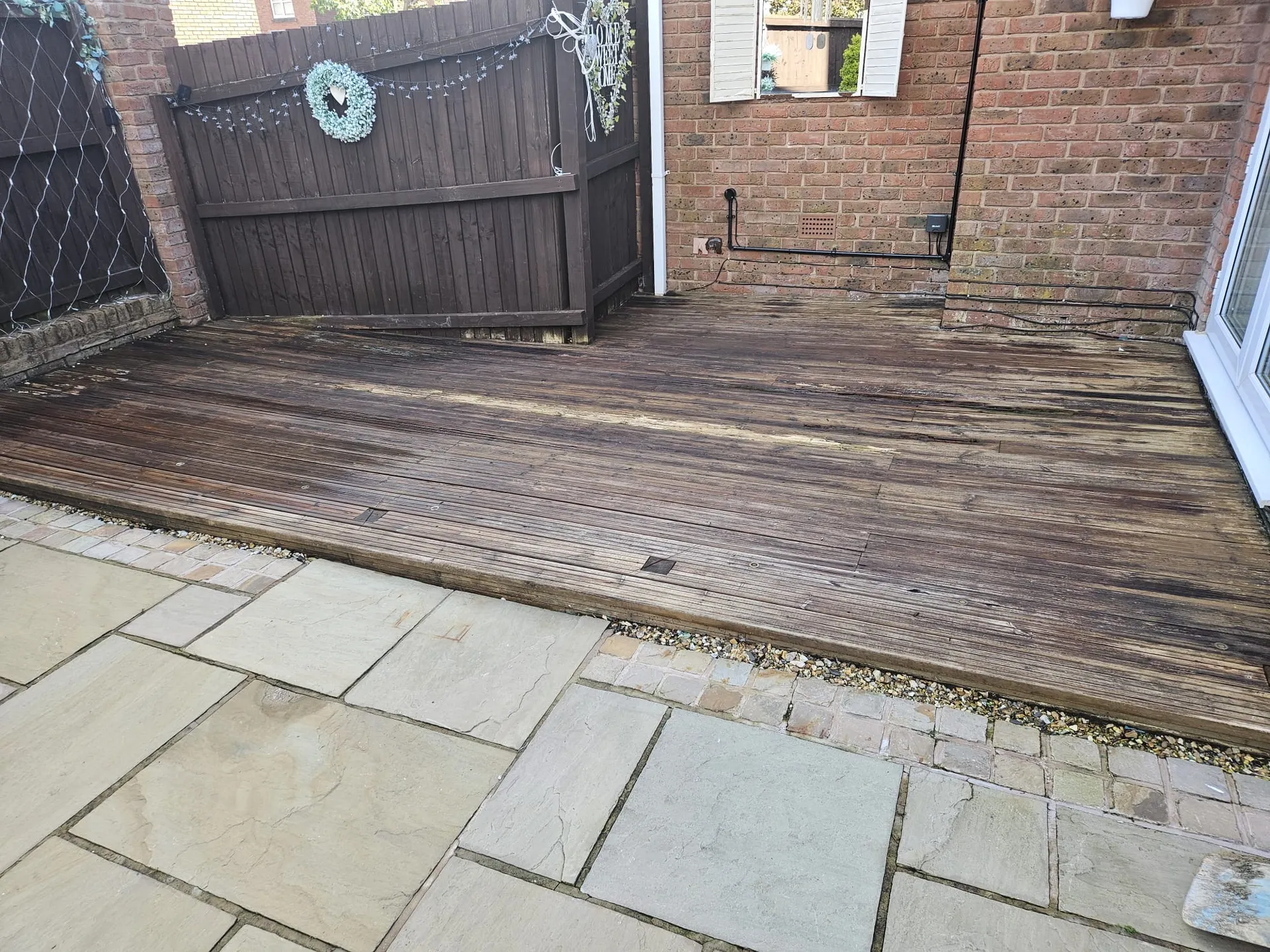 Damaged decking prior to composite installation