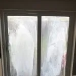 Condensation Between Double Glazed Windows in Bolton
